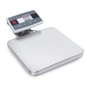 A stainless steel bench scale sits with a Courier 5000 digital indicator showing zero on a clean white background for weighing tasks.